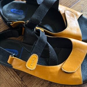Wolky’s.    Mustard Leather Strappy Sandals with Black Elastic